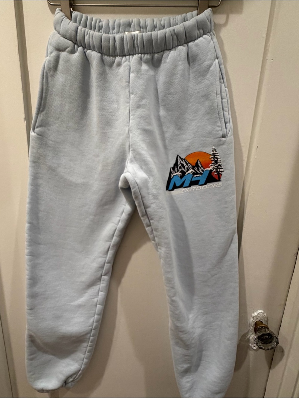 Madhappy Light Blue Joggers with Multicolor Outdoors Graphic